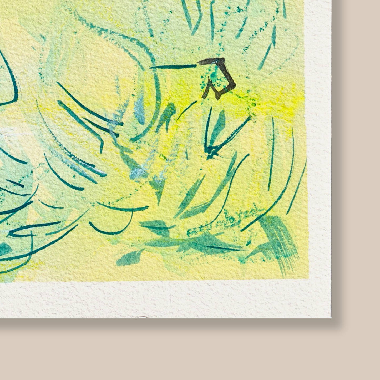 Close up of abstract mixed media painting on a textured cold pressed watercolour paper and a beige background