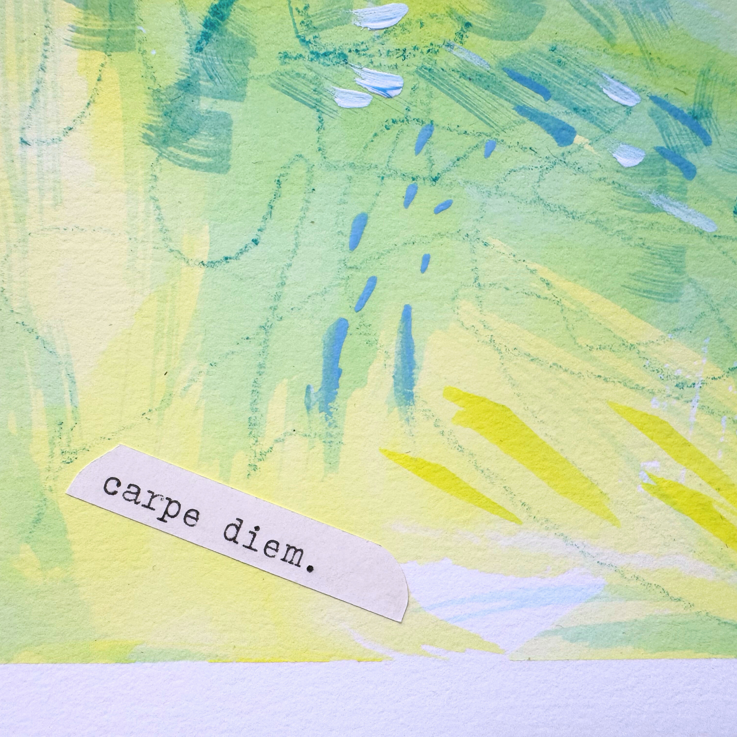 Close up of cheerful blue, green, yellow, pink abstract mixed media painting with flowers, typewritten text 'Carpe Diem' on a smooth hot-pressed watercolour paper