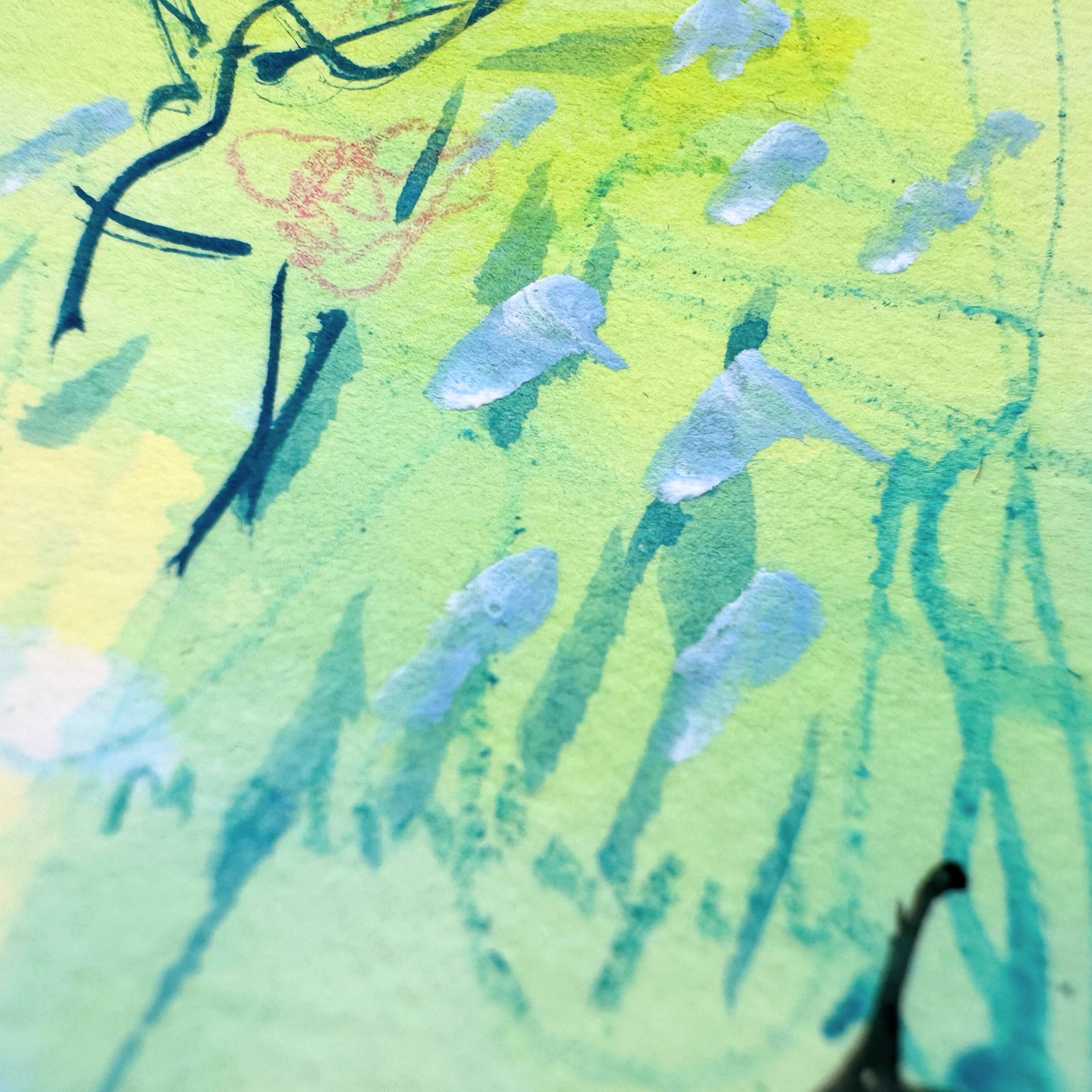 Close up of cheerful blue, green, yellow, pink abstract mixed media painting with flowers on a smooth hot-pressed watercolour paper