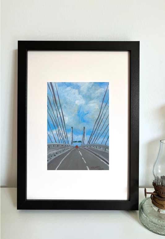 Framed artwork of Penang Second bridge with a blue sky and clouds.