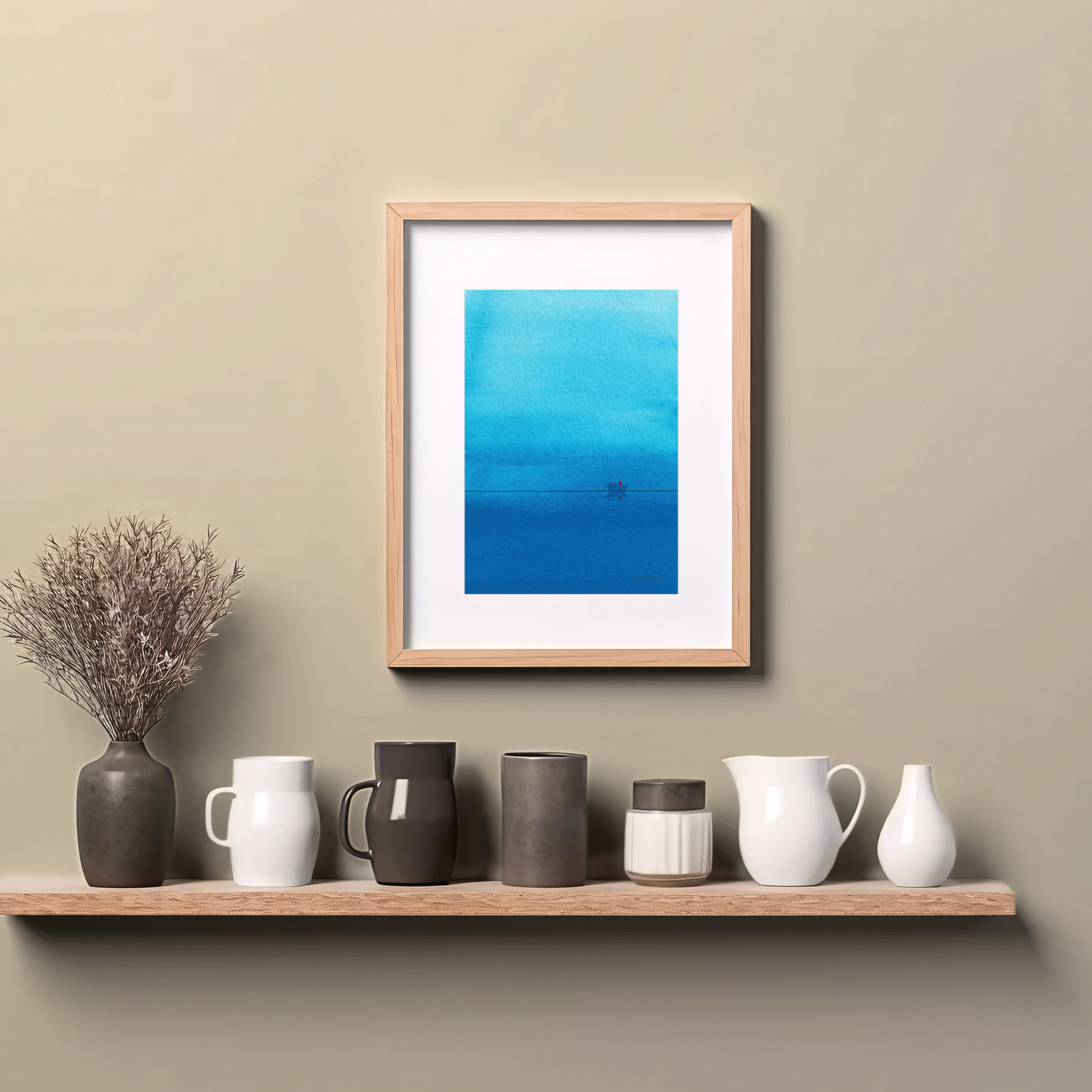 Framed blue abstract A4 art print with an abstract boat and a red mark on thin black lines, propped on a wall on a wooden shelf