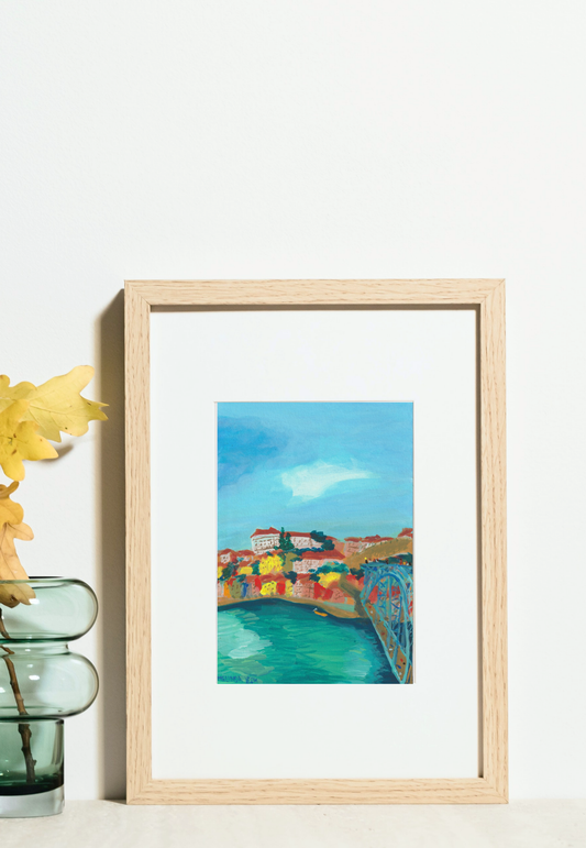 Framed painting of Dom Luís I Bridge (Ponte de Dom Luís I) over Douro river with the colourful houses of Porto historical centre in the background