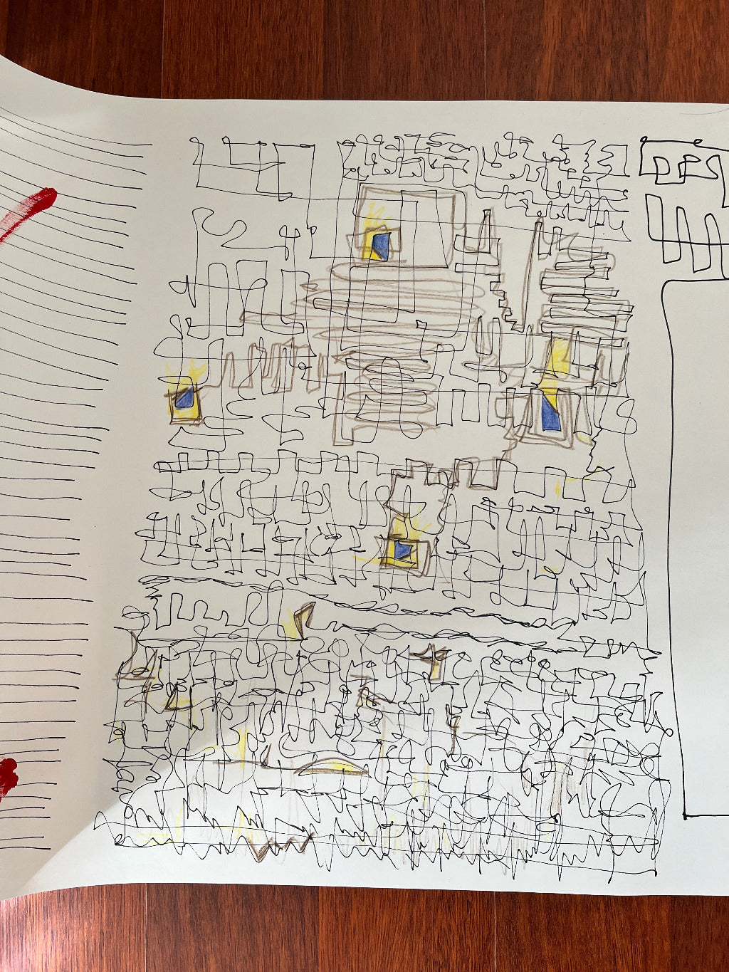 Intuitive abstract drawing on a piece of paper with colored-pencils and pen on a wooden surface by Melinda Yeoh Art