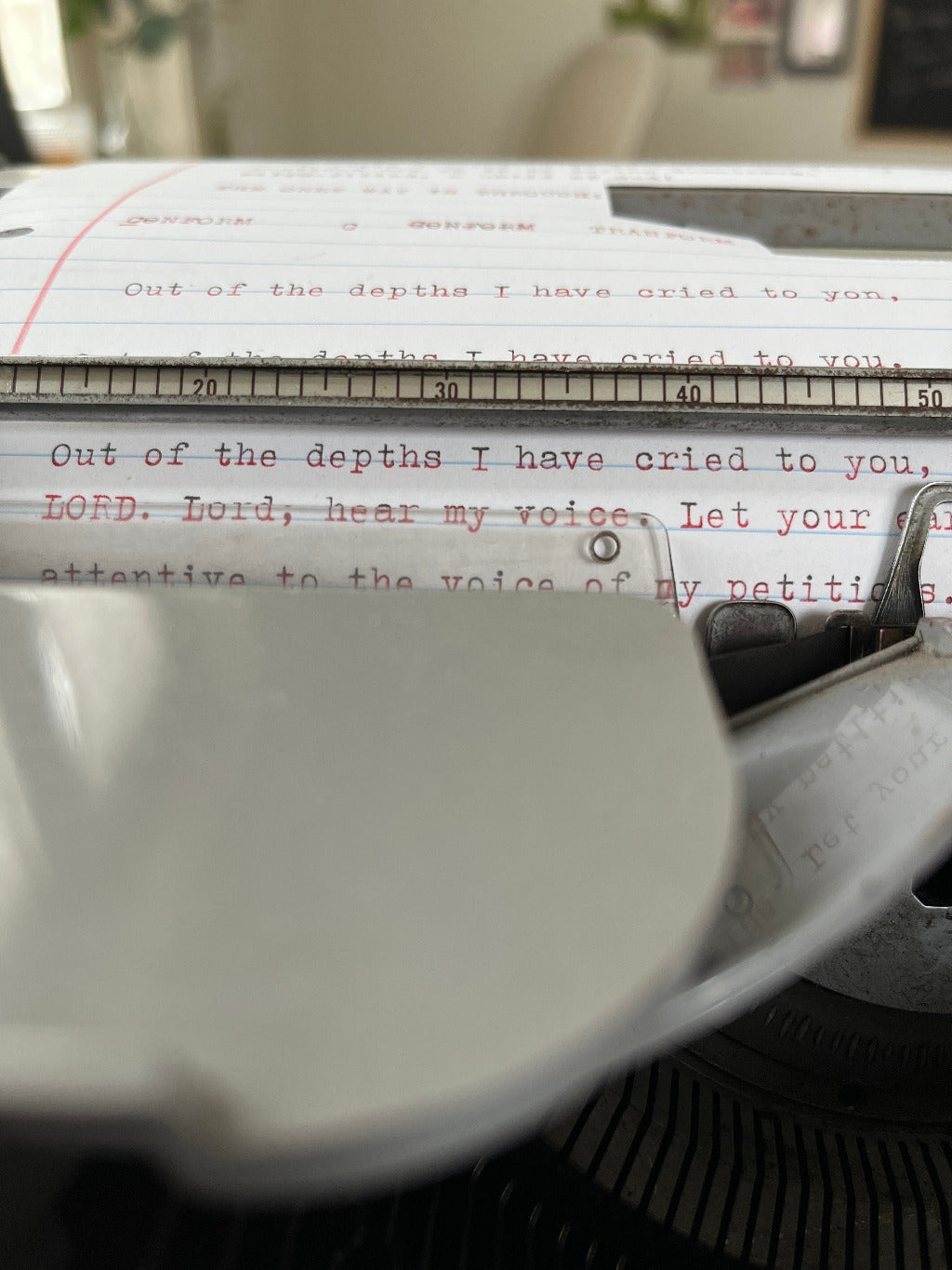 Close-up of a typewriter with text on the paper of Psalm 130:1-2 by Melinda Yeoh Art from monologue\worship/conversations series