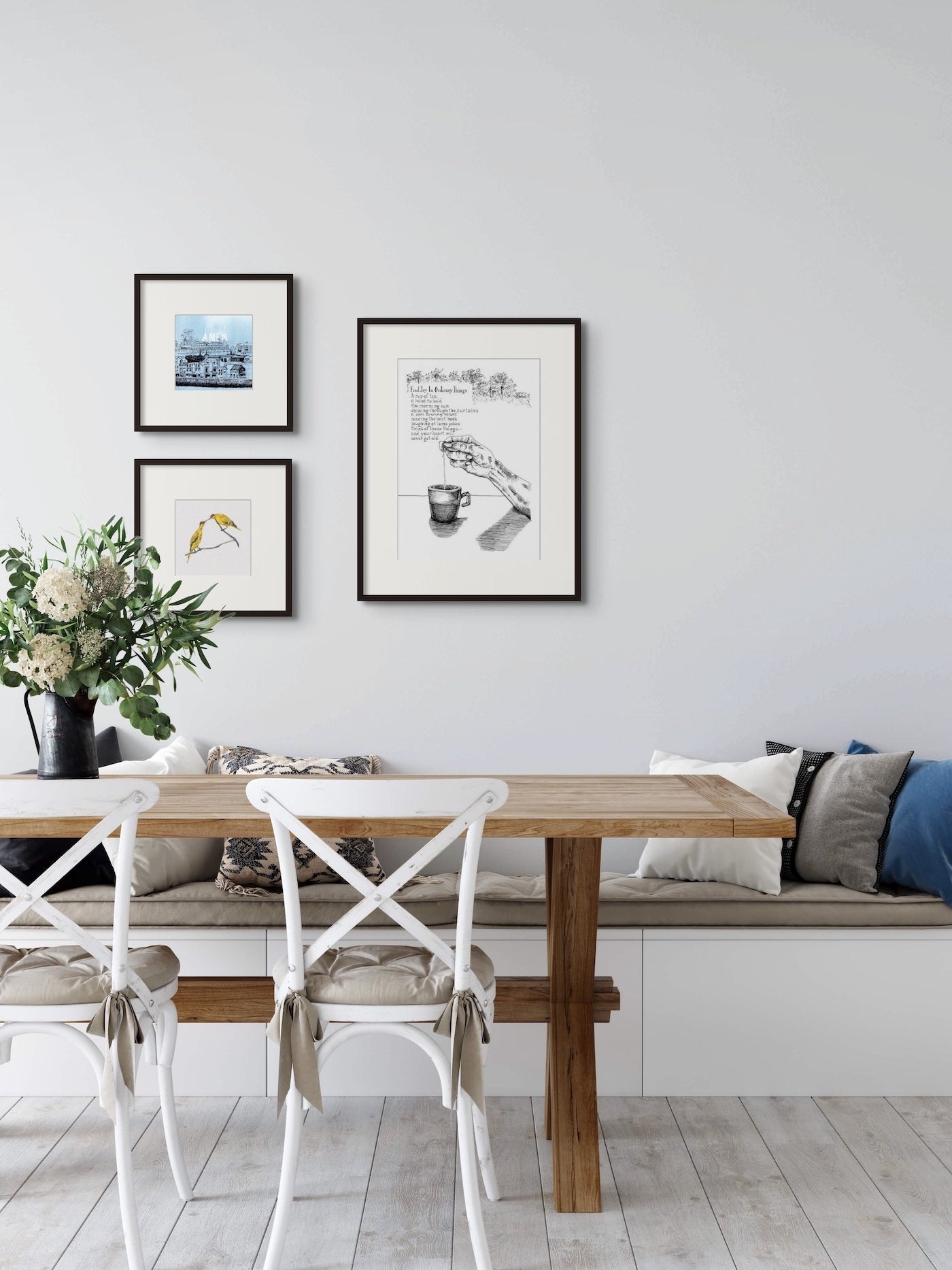 Image: set a three framed line drawing art prints in a living room