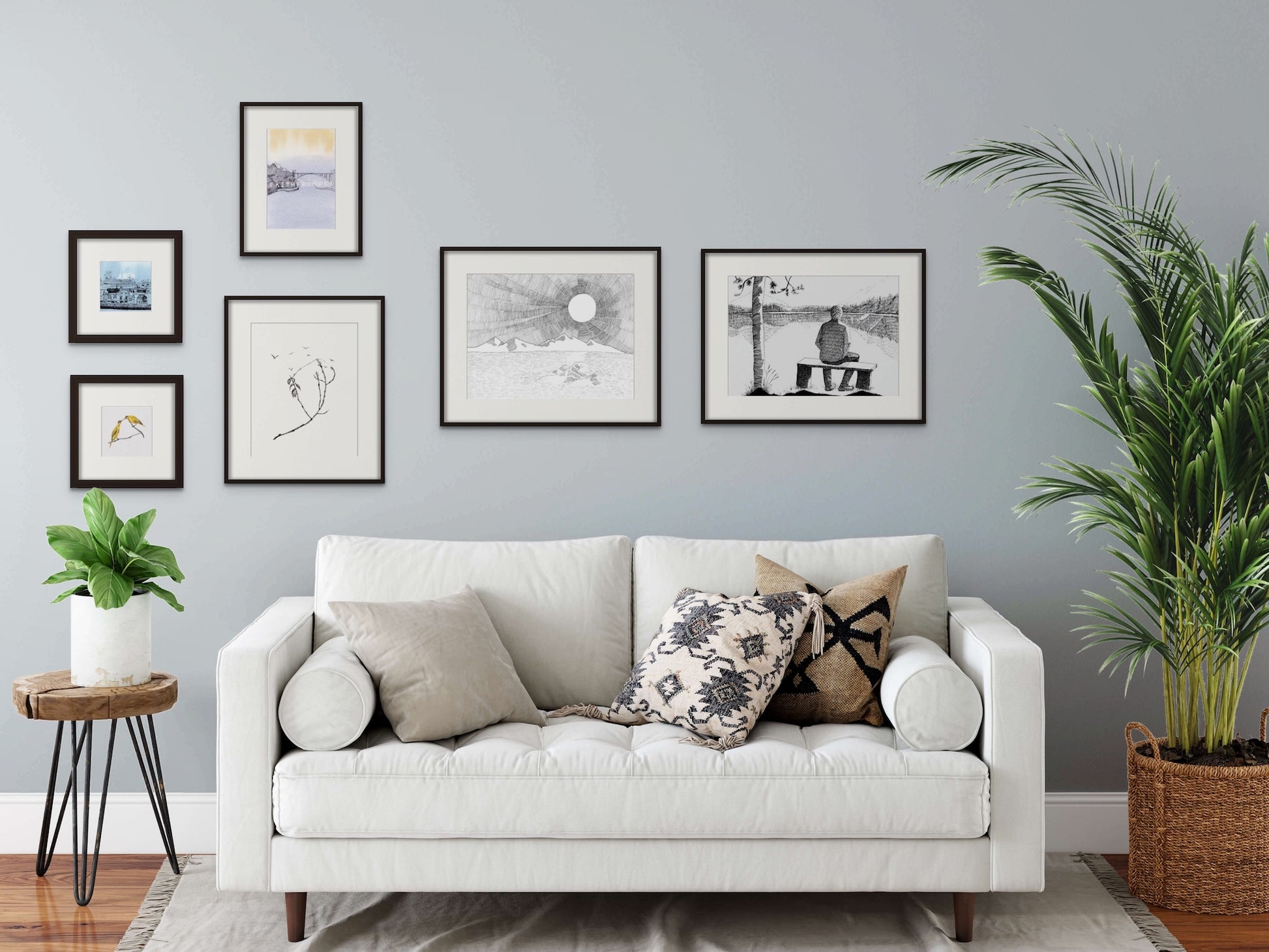 Image: a gallery wall of framed line drawing art prints in a living room